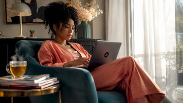 Woman using phone to track fashion order