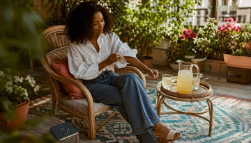 Woman wearing relaxed fit jeans indoors