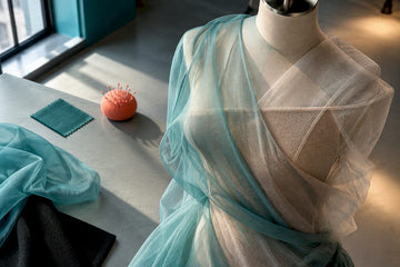 Sheer fabrics layered for coverage comparison