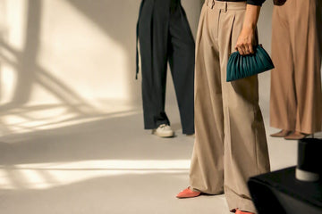 Wide-leg trouser styling details in editorial light