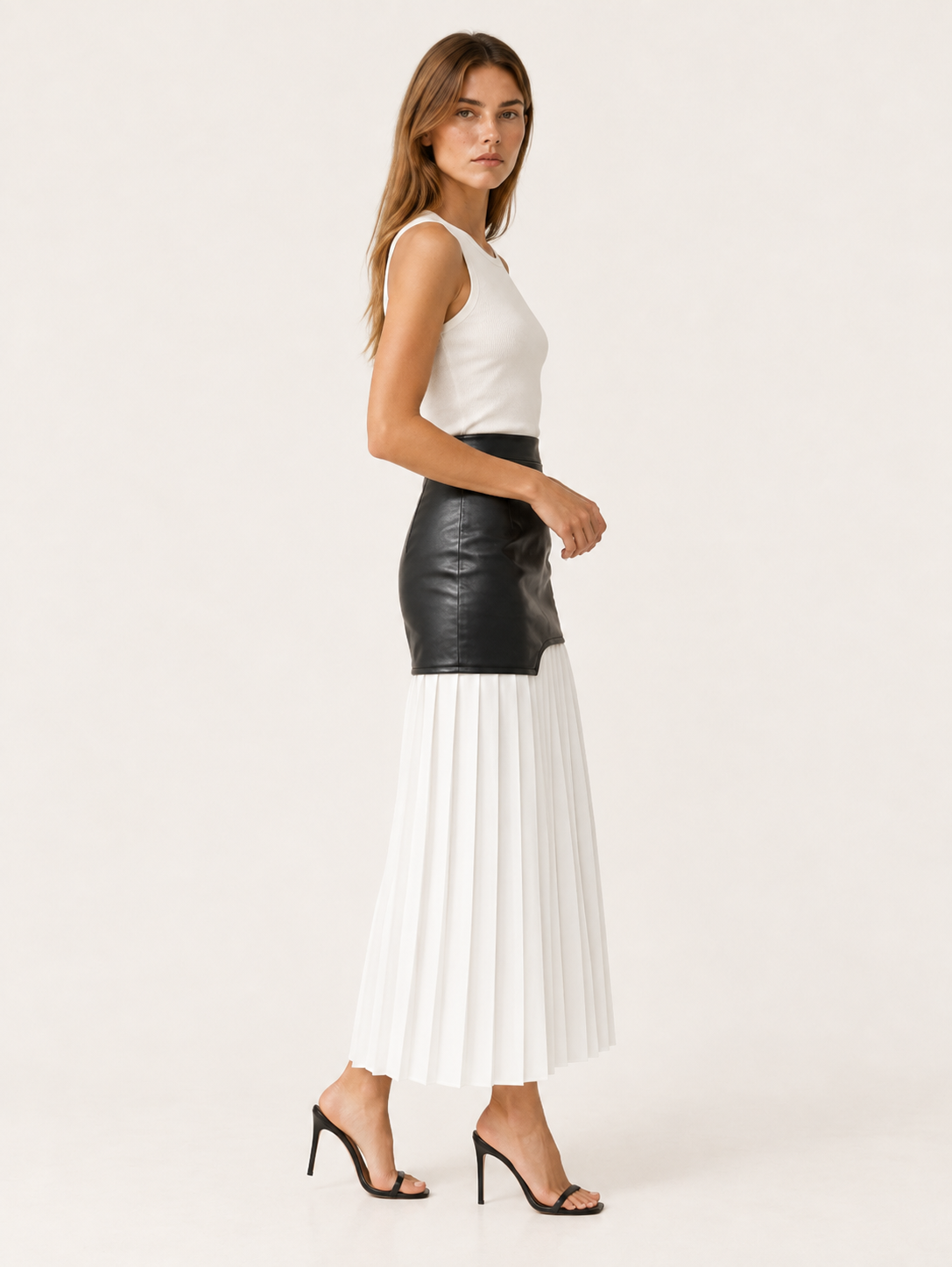 Evara | Asymmetrical Midi Skirt with Pleated Panel Faux Leather Look